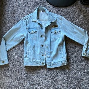 Stheart denim jacket with black and white flag sewn on back